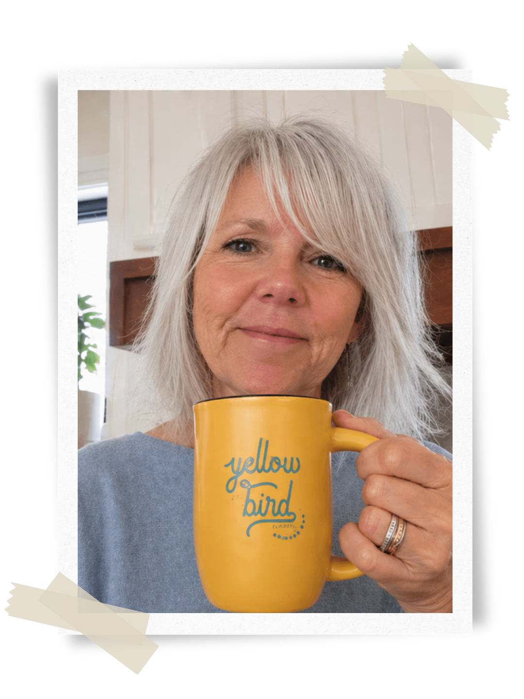 Christy Ojile smiling with a yellow coffee mug in her hand. Online mentoring and coaching for tired, overwhelmed moms.